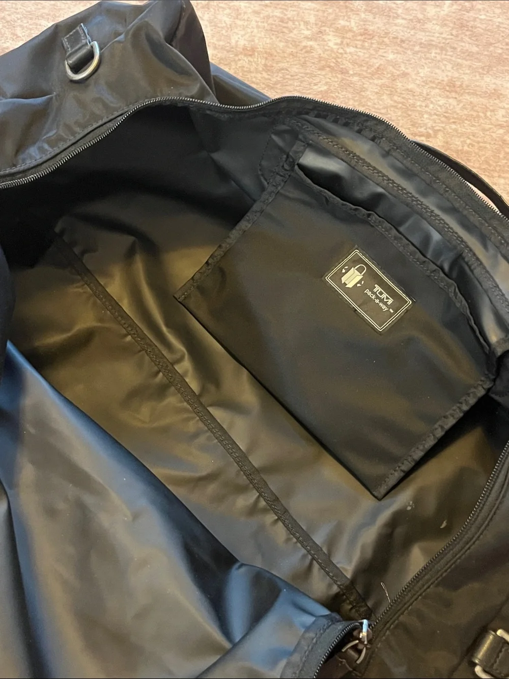 Tumi sleek black